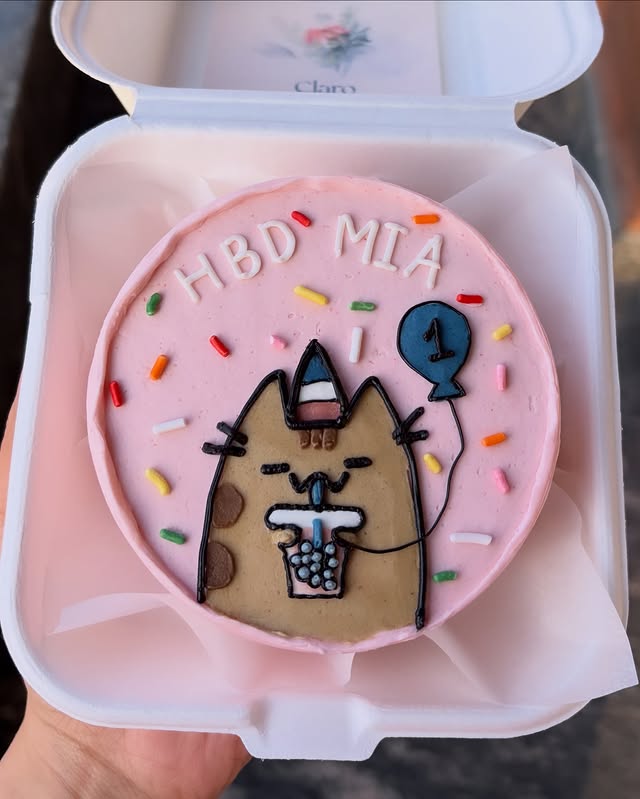 Bubble-tea cat character bento cake for a first birthday